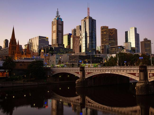 A quiet Melbourne city skyline during the Covid-19 pandemic, pictured at what would normally be a busy Friday night peak.  Picture: Mark Stewart