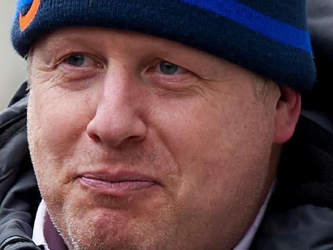 London Mayor Boris Johnson arrives home in London on February 21 , 2016 Prime Minister David Cameron made a last-ditch appeal to London Mayor Boris Johnson to support Britain staying in the EU Sunday as he battles to make his case to eurosceptics ahead of a June 23 referendum. Cameron used a BBC interview to address the charismatic Johnson, who is expected to announce his position at 2200 GMT on February 21 in a move which could transform the out campaign if he backs them. If reports suggesting the mayor will back so-called 'Brexit' are correct, it would deal a major blow to Cameron two days after he sealed a deal in Brussels to reset Britain's ties with the European Union. / AFP / NIKLAS HALLE'N