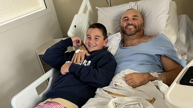 Ben Williams and his son, Sol, in hospital afer the accident.