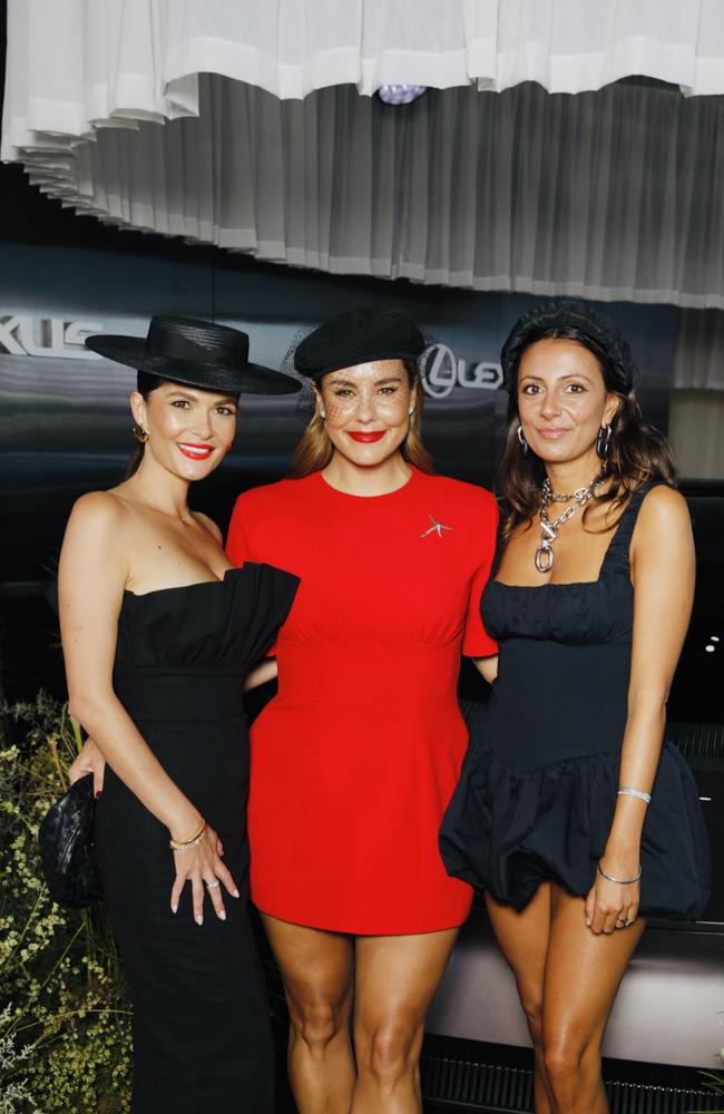 Chloe Fisher, Lauren Phillips and Jaynee Penny arrive at the LANDMARK by Lexus marquee. Picture: Supplied