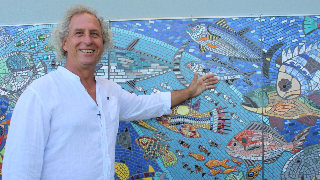 Two years in the making, 230 contributors from around the country, 100,000 pieces of tessera and an army of volunteers is what it took to bring Paul Perry's vision for the new artwork surrounding the public toilets at Archie's Beach.