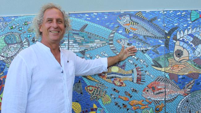 Two years in the making, 230 contributors from around the country, 100,000 pieces of tessera and an army of volunteers is what it took to bring Paul Perry's vision for the new artwork surrounding the public toilets at Archie's Beach.
