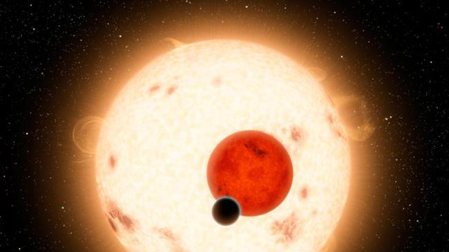 This image provided by NASA shows an artist's depiction showing a discovery by NASA's Kepler mission of a world where two suns set over the horizon instead of just one. The planet, called Kepler-16b, is the most |Tatooine-like| planet yet found in our galaxy and is depicted here with its two stars. Tatooine is the name of Luke Skywalker's home world in the science fiction movie Star Wars. In this case, the planet it not thought to be habitable. It is a cold world, with a gaseous surface, but like Tatooine, it circles two stars. The largest of the two stars, a K dwarf, is about 69 percent the mass of our sun, and the smallest, a red dwarf, is about 20 percent the sun's mass. (AP photo/NASA)