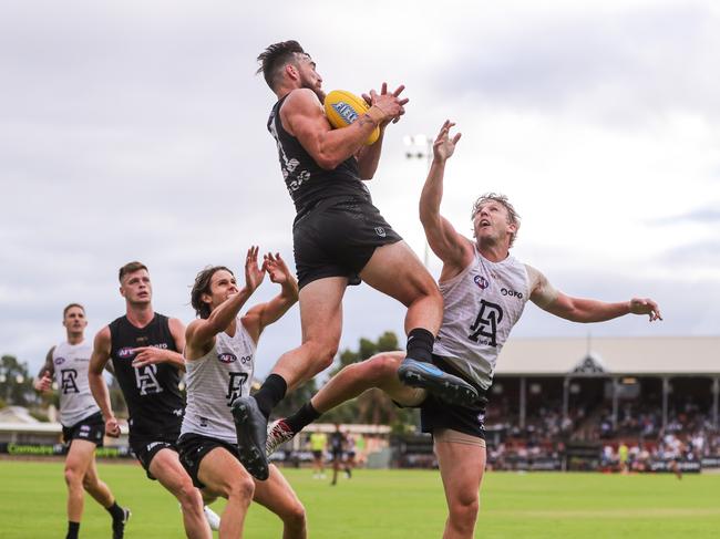 ADELAIDE, AUSTRALIA - FEBRUARY 14: Charlie Dixon marks the ball over Trent McKenzie during the Port Adelaide Power Intra-Club match at Alberton Oval on February 14, 2020 in Adelaide, Australia. (Photo by Matt Turner/AFL Photos via Getty Images)