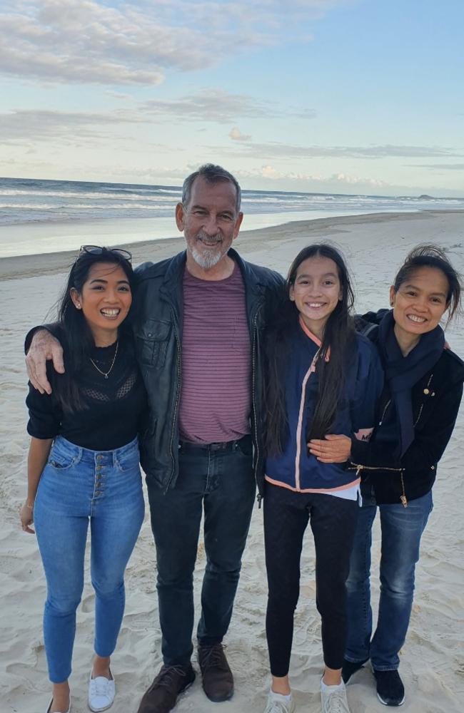 Sarah Caisip (left) with her father Bernard Prendergast, younger sister Isobel Prendergast, 11, and mother Myrna Prendergast.