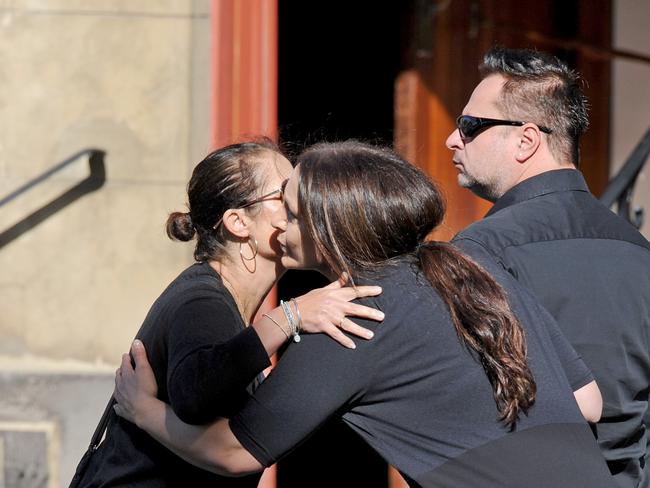 Mourners arrive for the funeral. Picture: AAP