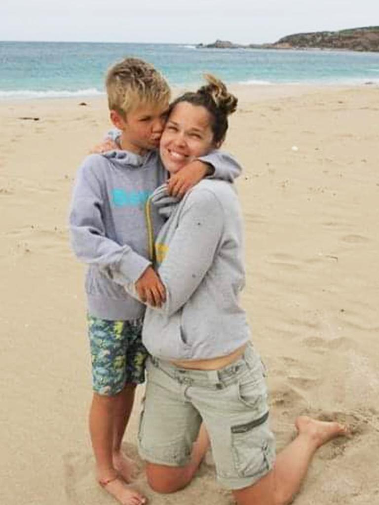 Benjy giving mum a kiss on the cheek at the beach. Picture: Supplied