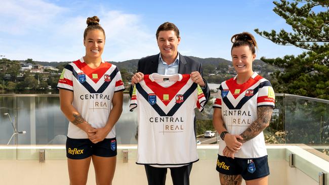 Central Coast Roosters players Isabelle Kelly (l) and Jayme Fressard, with Central Real chief executive Richard Ellis.