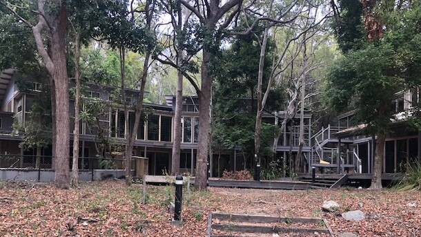 Was once general store/environment centre...now in very bad repair overlooking empty duck pond