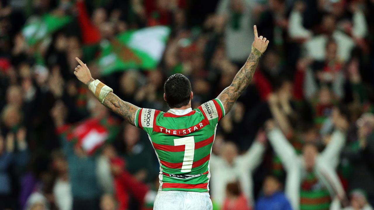 Adam Reynolds celebrates victory after converting his winning try in the famous 2012 game against the Roosters.