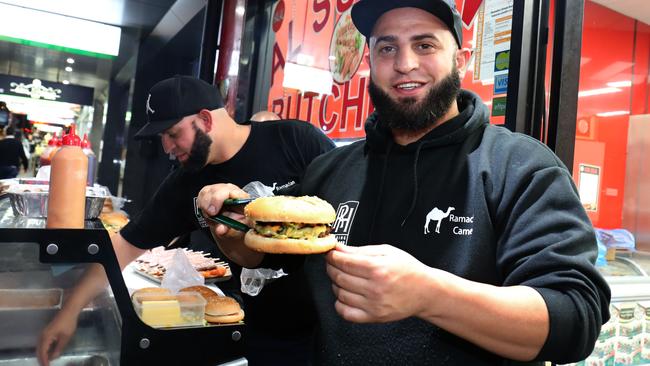 Faisal Alameddine  loves the camel burgers they are selling at Haldon street. Picture: Robert Pozo