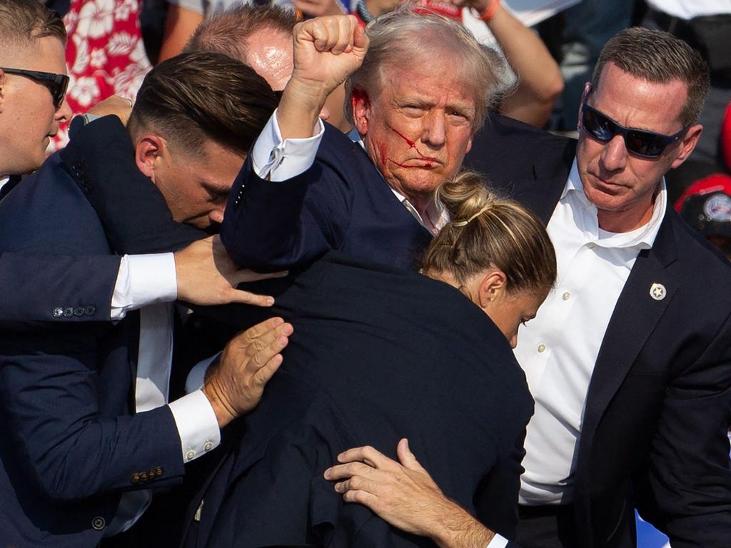 Donald Trump gestures after being shot. Picture: AFP