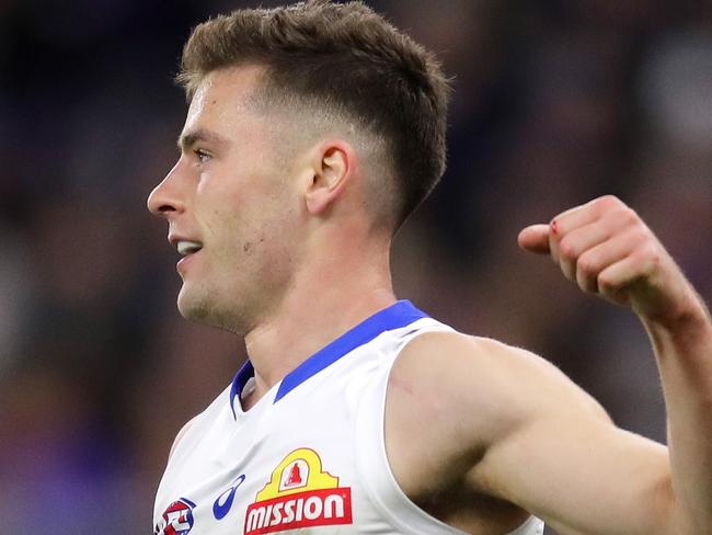 PERTH, AUSTRALIA - SEPTEMBER 03: Josh Dunkley of the Bulldogs celebrates after scoring a goal during the 2022 AFL First Elimination Final match between the Fremantle Dockers and the Western Bulldogs at Optus Stadium on September 3, 2022 in Perth, Australia. (Photo by Will Russell/AFL Photos via Getty Images)