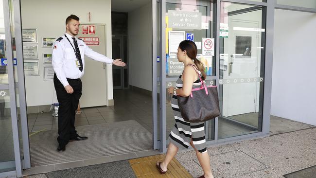 Social distancing enforced as people move inside the Centrelink office in Nundah, Brisbane. Picture: AAP Image/ Claudia Baxter.