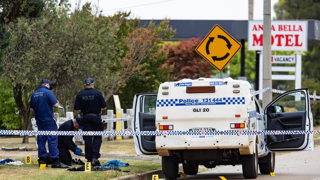 Police at the scene of the shooting on Saturday. Picture: Julian Andrews.