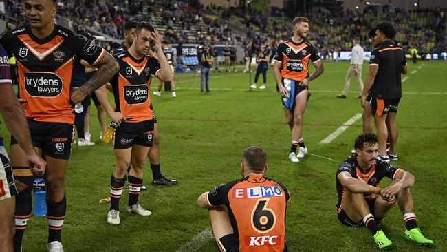 The Tigers look dejected after losing. Picture: Ian Hitchcock/Getty Images