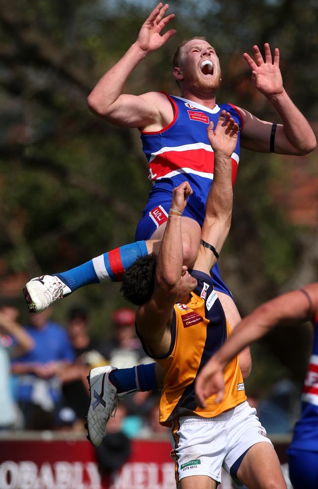 Andrew Browne of Keilor flies for a mark. Picture: Mark Dadswell