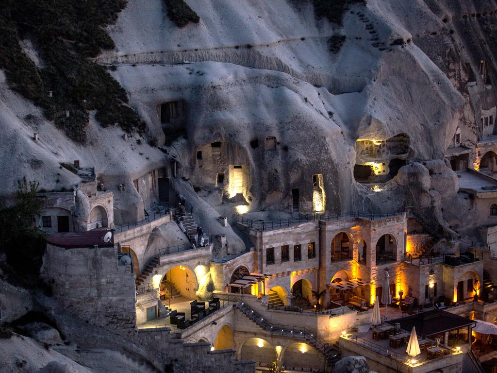 A cave hotel is seen at sunset in the town of Goreme on April 17, 2016 in Nevsehir, Cappadocia, Turkey. Picture: Getty