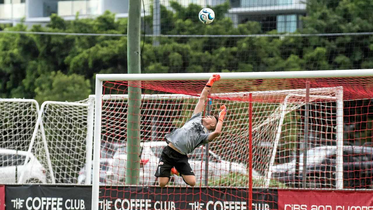 GOOD SAVE: South West Queensland Thunder keeper Jacob Sayle touches the ball over the crossbar in his side's loss to Olympic. The Thunder men play their first home of the season against North Queensland today at Clive Berghofer Stadium from 5pm. Picture: DSL Photography