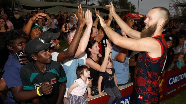 Melbourne star Max Gawn hams it up with fans at Traeger Park in Alice Springs after last season’s win over Adelaide. Picture: AFL Media/Getty Images