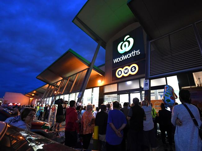 People queue for groceries in Coburb. Picture: AAP