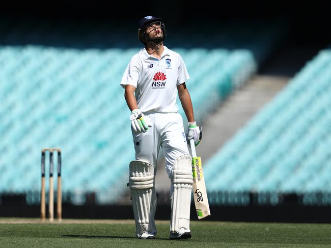 SYDNEY, AUSTRALIA - FEBRUARY 19: Sam Konstas of the Blues walks off the field after been dismissed by Scott Boland of Victoria during the Sheffield Shield match between New South Wales Blues and Victoria at Sydney Cricket Ground on February 19, 2025 in Sydney, Australia. (Photo by Jason McCawley/Getty Images)