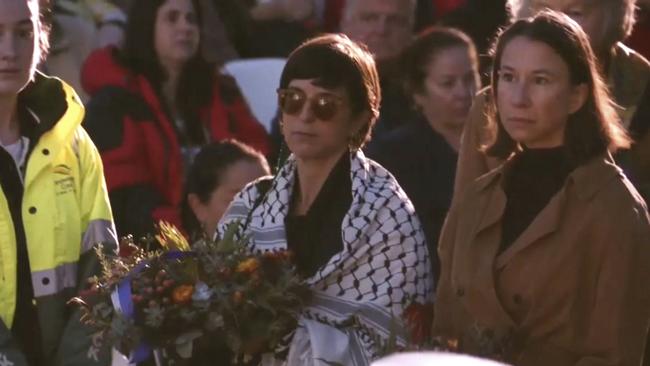 NSW Greens councillor Rafaela Pandolfini wearing an Arab keffiyeh at the Anzac Day dawn service in Coogee.