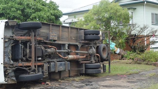 A removalist truck turned over on Crown St, South Lismore, after the floods hit. Picture: Nicholas Rupolo