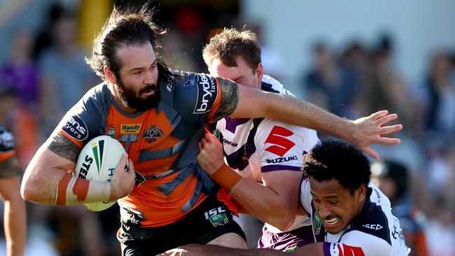 Aaron Woods on the charge for the Tigers against the Storm. Picture: Gregg Porteous