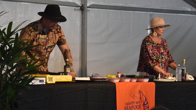 Dan and Steph Mulheron from Eat at Dan And Steph's preparing a cooking demonstration at the 2021 Hervey Bay Seafood Festival. Photo: Stuart Fast