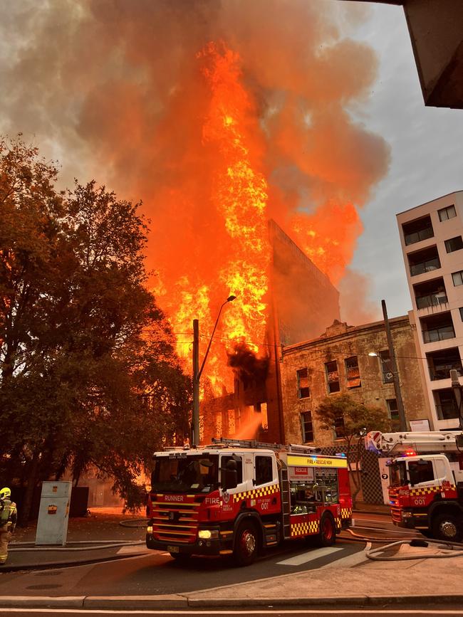 Fire takes hold of the empty building. Picture: Neil Bennett