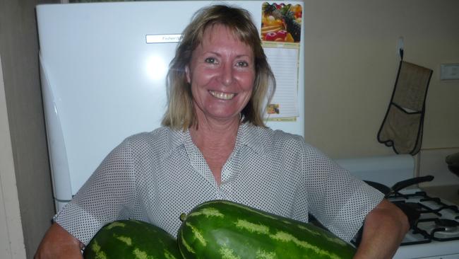 Gayle Woodford with watermelons from the garden she planted around the nurses quarters. Picture: Supplied by family