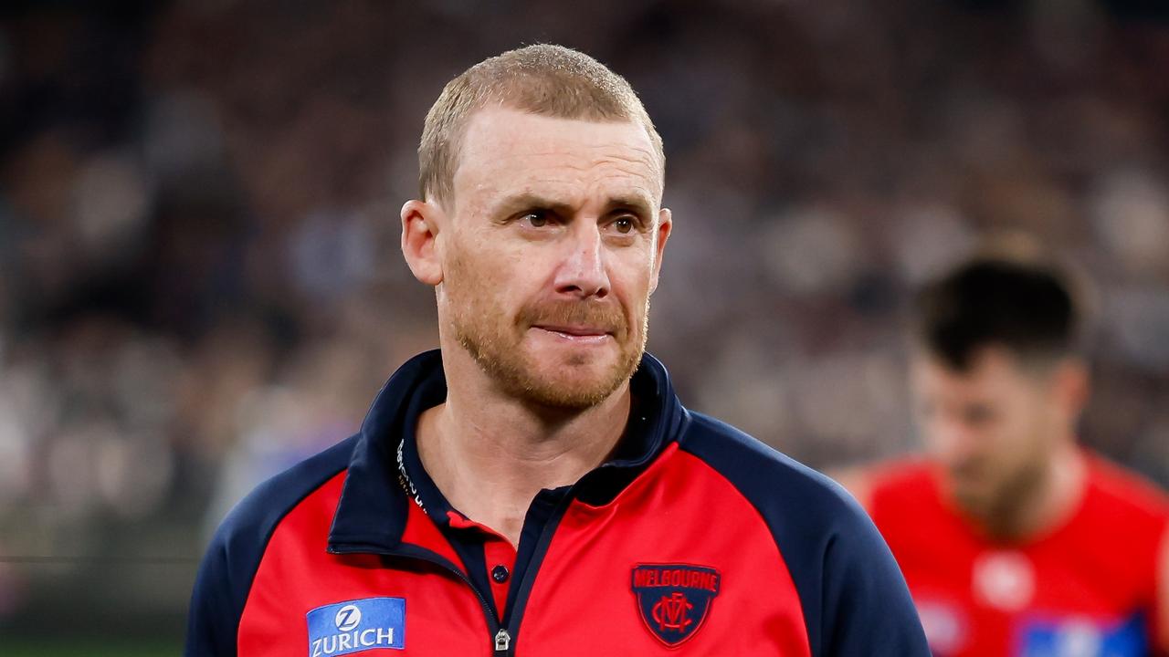 MELBOURNE, AUSTRALIA - SEPTEMBER 15: Simon Goodwin, Senior Coach of the Demons looks dejected after a loss during the 2023 AFL First Semi Final match between the Melbourne Demons and the Carlton Blues at Melbourne Cricket Ground on September 15, 2023 in Melbourne, Australia. (Photo by Dylan Burns/AFL Photos via Getty Images)