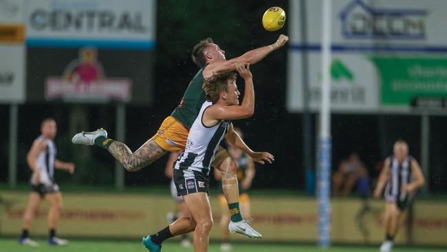 Lucas Jellyman-Turner and Steven Lampton compete for the ball. Picture: Glenn Campbell