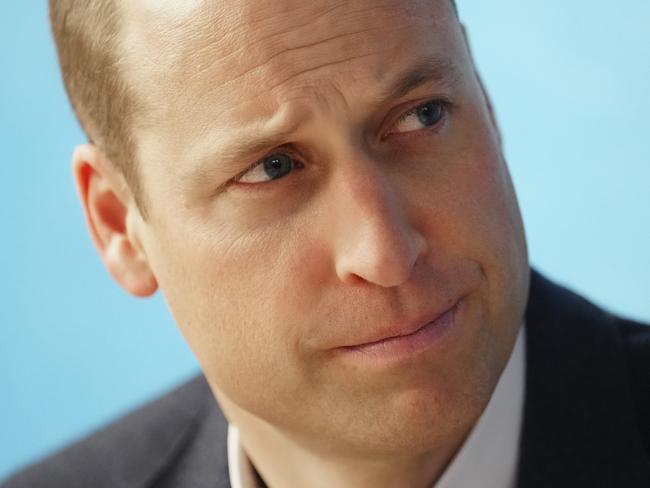 BIRKENHEAD, UNITED KINGDOM Ã¢â¬â JANUARY 12:  Prince William, Prince of Wales listens to staff as he and Catherine, Princess of Wales (not pictured) visit the Open Door Charity, a charity focused on supporting young adults across Merseyside with their mental health, using culture and creativity as the catalyst for change, at the charityÃ¢â¬â¢s flagship Bloom Building on January 12, 2023 in Birkenhead, England. The Prince and Princess of Wales are visiting Merseyside to thank those working in healthcare and mental health support for their work during the winter months. Their engagements take place 2 days after the official release of Prince Harry, Duke of Sussex's book "Spare".  (Photo by Jon Super-WPA Pool/Getty Images)