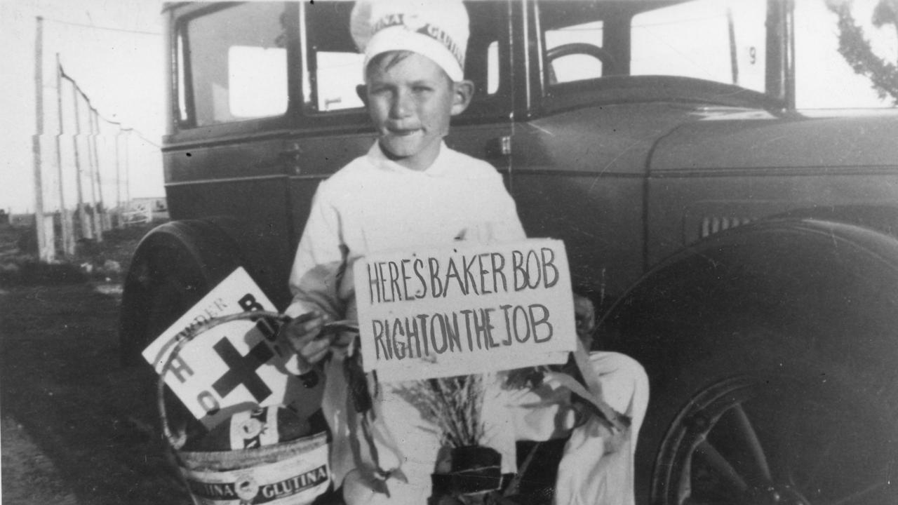 Bob Hawke selling hot cross buns.