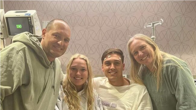 Zac Dumesny with family in hospital after undergoing critical brain surgery, the tumour turned out to be benign. Picture: ABC News