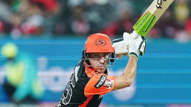 Scorchers keeper-batsman Josh Inglis angles a ball over backward point.