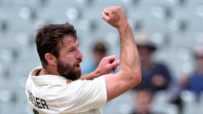 Australia's Michael Neser celebrates taking the wicket of West Indies batsman Marquino Mindley and victory during the fourth day of the second cricket Test match between Australia and the West Indies at the Adelaide Oval in Adelaide on December 11, 2022. (Photo by William WEST / AFP) / -- IMAGE RESTRICTED TO EDITORIAL USE - STRICTLY NO COMMERCIAL USE --