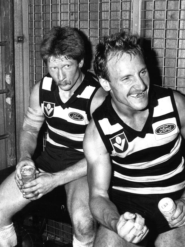 Neville Bruns and Gary Ablett celebrate victory.