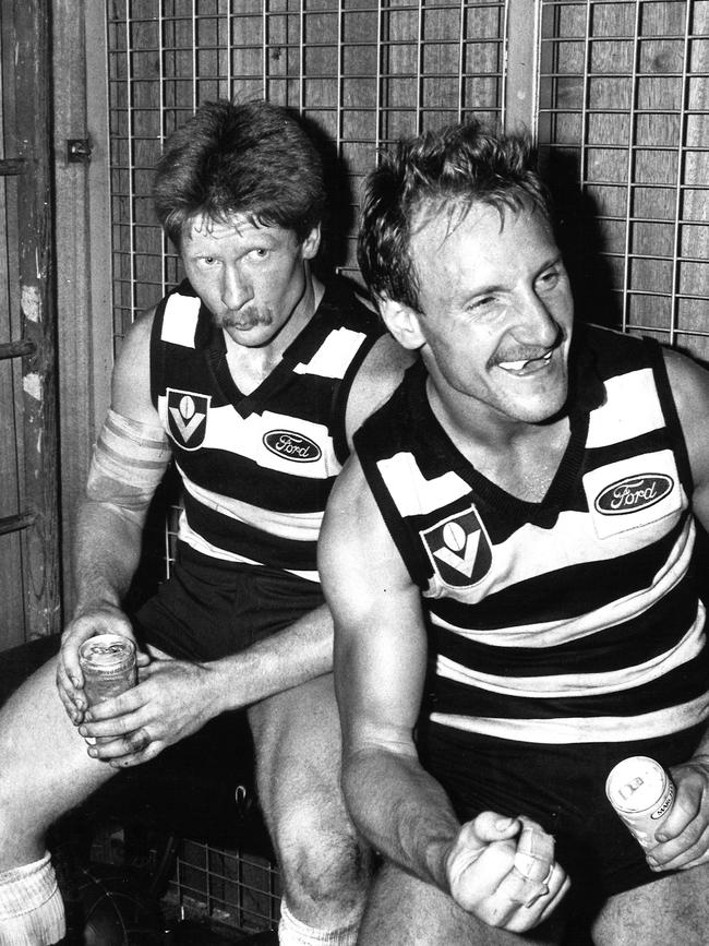 Neville Bruns and Gary Ablett celebrate victory.