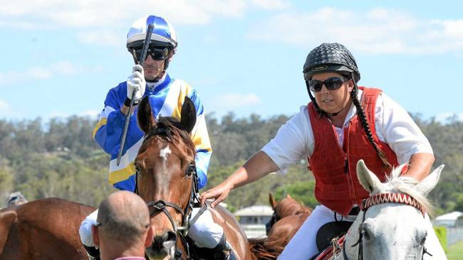 Jockey Justin Stanley guides Watchmen back to the Ipswich Turf Club enclosure after his win at Ipswich racetrack. Picture: Rob Williams