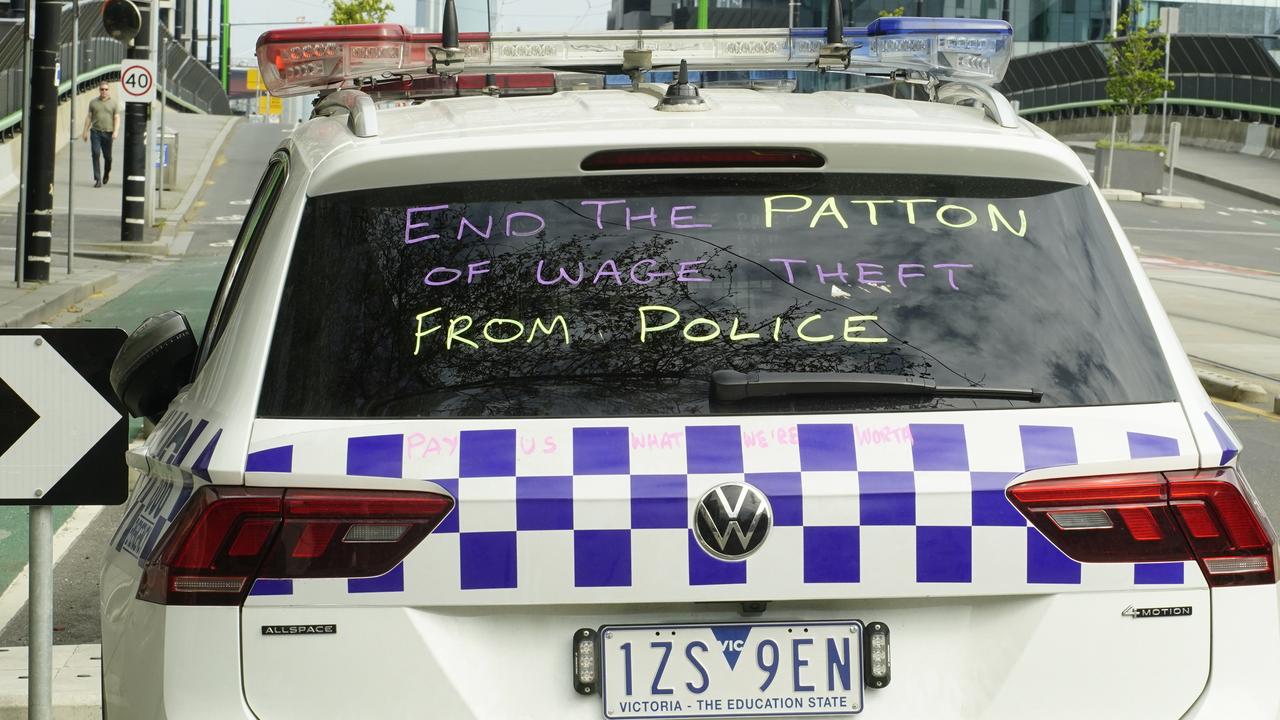 Victorian police cars have been marked with handwritten messages by police officers as a form of protest. Picture: NewsWire / Luis Enrique Ascui