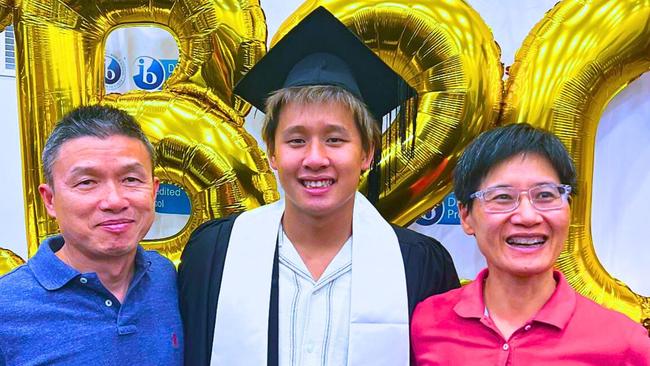 Ivan Lai has received one of the highest scores in the world for his year 12 results after undertaking an International Baccalaureate. He is pictured here with his parents. Picture: Contributed