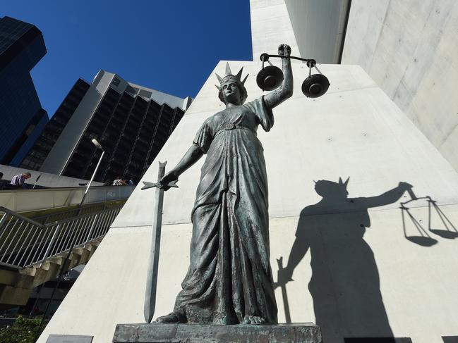 A statue of Themis, the Greek God of Justice stands outside the Supreme Court in Brisbane, Thursday, Oct. 20, 2016. (AAP Image/Dave Hunt) NO ARCHIVING