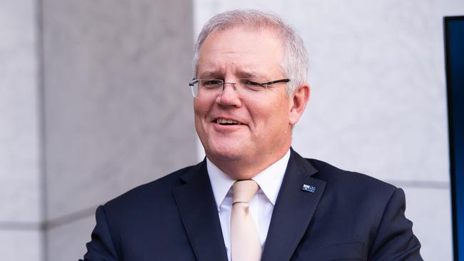 Scott Morrison announces the roadmap back to normality at Parliament House in Canberra on Friday. Picture: Getty Images