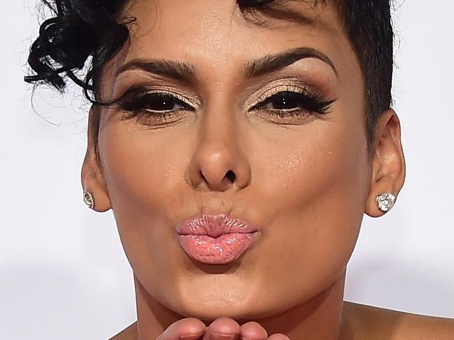 Laura Govan poses on arrival for the world premiere of the film 'The Wedding Ringer' in Hollywood, California on January 6, 2015. The film opens nationwide on January 16. AFP PHOTO / Frederic J. BROWN