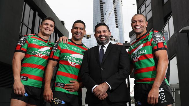 South Sydney players (l-r) James Roberts, Cody Walker, Braidon Burns and Crown representative Barry Lenihan who is leading Crown's Indigenous Employment program, with the new Crown Sydney in the background. Picture: Brett Costello