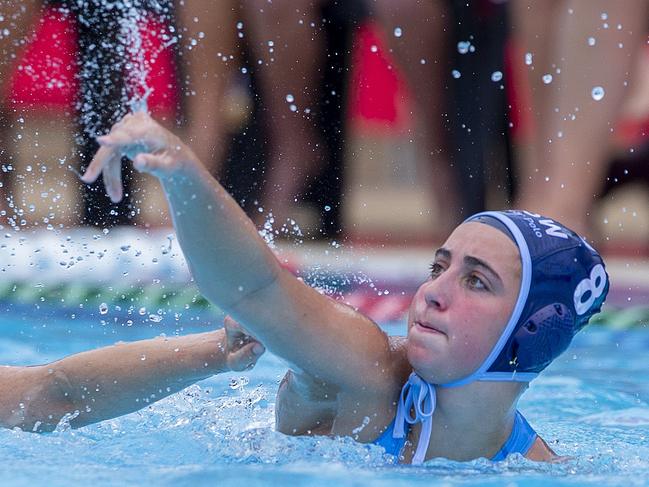 Action from the Water Polo 15&U and 17&U Female National State Championships at the Gold Coast Aquatic Centre, Southport, on Tuesday 27 September 2022.  15&U Gold  medal game match between QLD Maroon and NSW Blues.  QLD's #2  Elyanna Astone and NSW's  #8 Saskia Dunn.  Picture: Jerad Williams