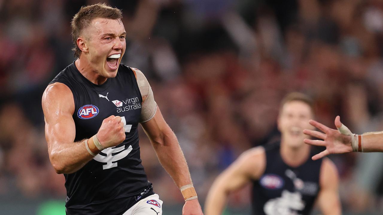 Patrick Cripps celebrates a goal against the Magpies.